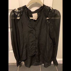Black long sleeve blouse .